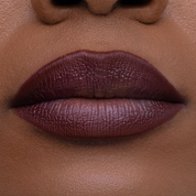 I Need a Nude Lip Crayon shade 'Cherry Cola' model look.
